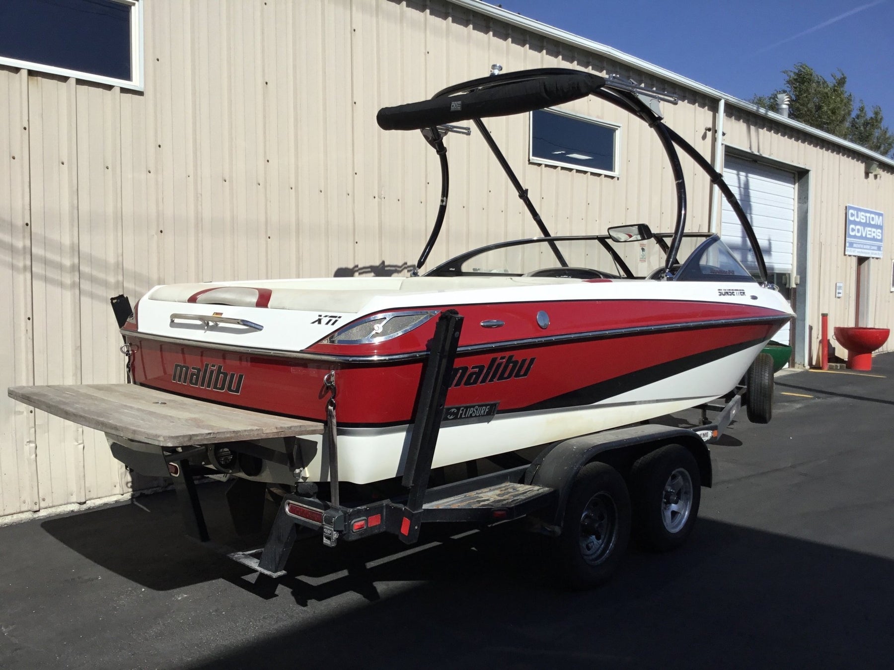 Malibu Sunsetter XTi with Titan 3 Tower and FCT bimini Double Up Storage cover - BoardCo